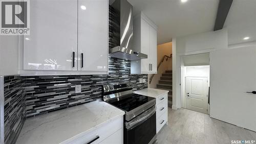 147 Woolf Bend, Saskatoon, SK - Indoor Photo Showing Kitchen