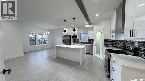 147 Woolf Bend, Saskatoon, SK - Indoor Photo Showing Kitchen With Upgraded Kitchen