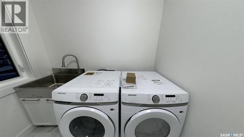 147 Woolf Bend, Saskatoon, SK - Indoor Photo Showing Laundry Room