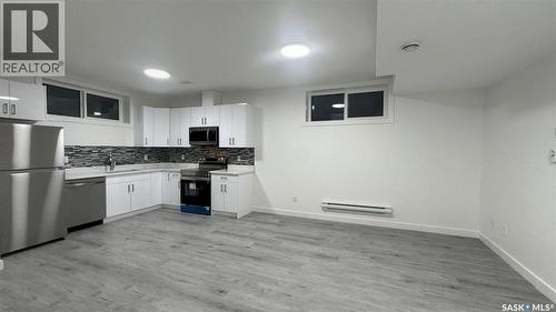 147 Woolf Bend, Saskatoon, SK - Indoor Photo Showing Kitchen With Stainless Steel Kitchen