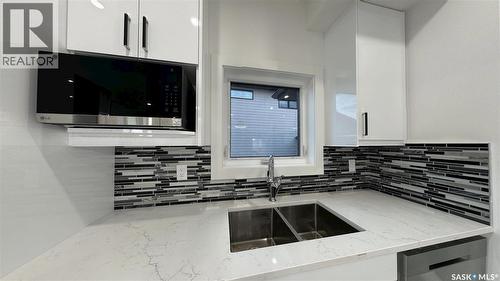 147 Woolf Bend, Saskatoon, SK - Indoor Photo Showing Kitchen