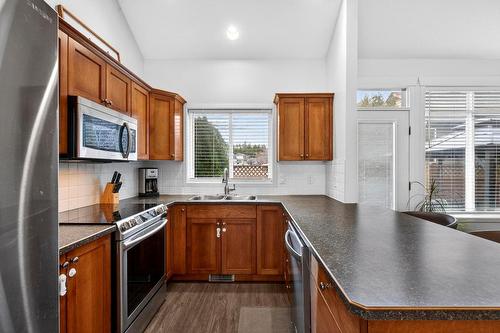 1-1450 Rose Meadow Drive, West Kelowna, BC - Indoor Photo Showing Kitchen With Double Sink