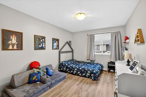 1-1450 Rose Meadow Drive, West Kelowna, BC - Indoor Photo Showing Bedroom