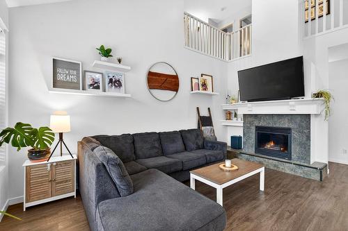1-1450 Rose Meadow Drive, West Kelowna, BC - Indoor Photo Showing Living Room With Fireplace