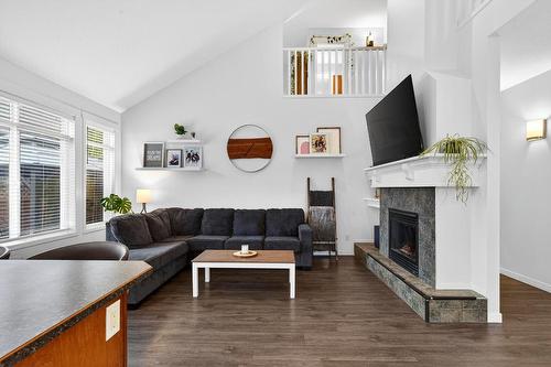1-1450 Rose Meadow Drive, West Kelowna, BC - Indoor Photo Showing Living Room With Fireplace