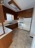112 2Nd Avenue E, Kelvington, SK  - Indoor Photo Showing Kitchen With Double Sink 