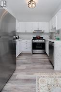 1st floor kitchen with pass-thru & quartz - 