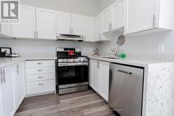 1st floor kitchen with pass-thru & quartz - 