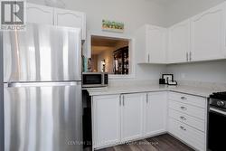 1st floor kitchen with pass-thru & quartz - 