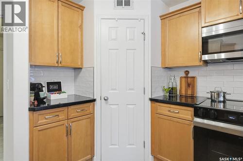 323 Hettle Cove, Saskatoon, SK - Indoor Photo Showing Kitchen