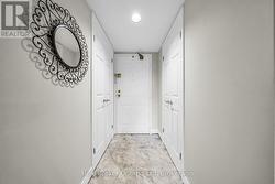 Front Entrance Closet, Front Door + Laundry - 