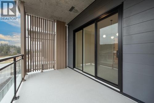 75 Predator Ridge Drive Unit# 205, Vernon, BC - Outdoor With Balcony With Exterior