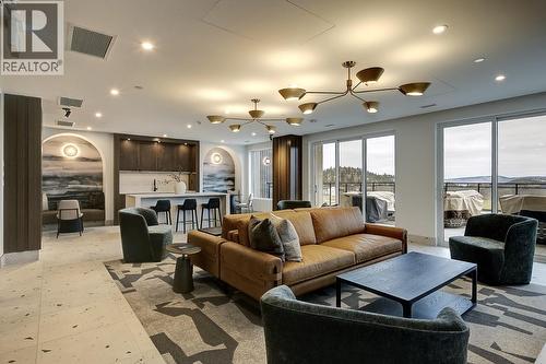 75 Predator Ridge Drive Unit# 205, Vernon, BC - Indoor Photo Showing Living Room