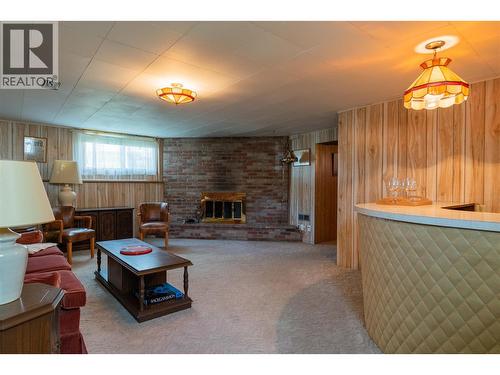 945 Thackeray Street, Warfield, BC - Indoor With Fireplace