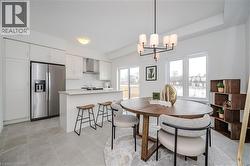 Dining space with a chandelier - 