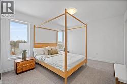 Carpeted bedroom featuring baseboards - 