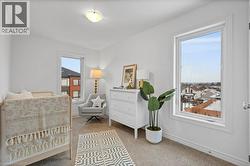 Carpeted bedroom with baseboards - 