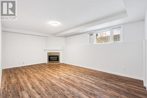 Finished basement with fireplace - 1321 Morley Boulevard, Ottawa, ON - Indoor With Fireplace