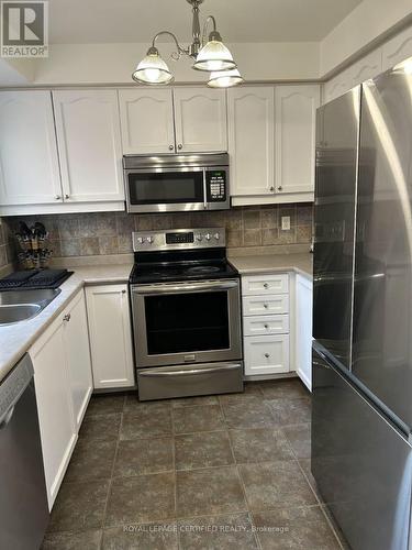 5126 Des Jardines Drive, Burlington, ON - Indoor Photo Showing Kitchen With Stainless Steel Kitchen With Double Sink