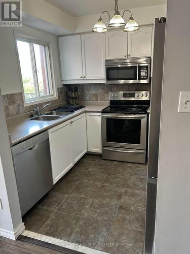 5126 Des Jardines Drive, Burlington, ON - Indoor Photo Showing Kitchen With Stainless Steel Kitchen With Double Sink