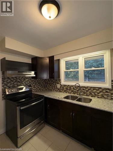 105 Westmount Road E, Kitchener, ON - Indoor Photo Showing Kitchen With Double Sink