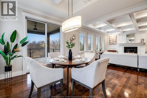 6 Two Creeks, Wheatley, ON - Indoor Photo Showing Dining Room With Fireplace