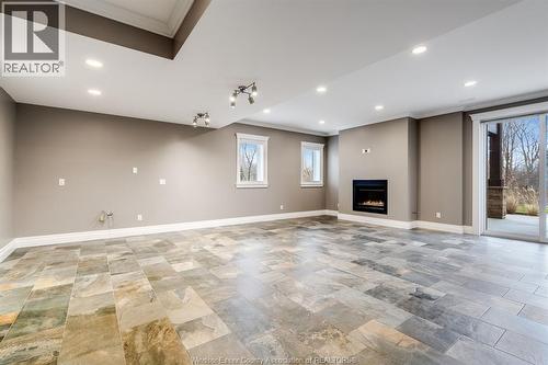 6 Two Creeks, Wheatley, ON - Indoor With Fireplace