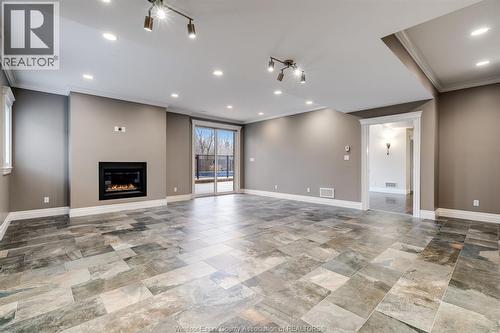 6 Two Creeks, Wheatley, ON - Indoor With Fireplace