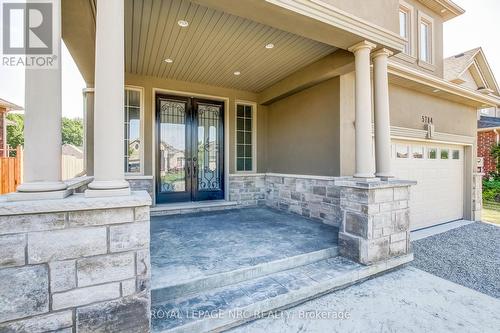 Stamped concrete porch - 5784 Ironwood Street, Niagara Falls (Forestview), ON - Outdoor With Deck Patio Veranda With Exterior