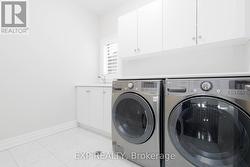 Convenient Upper Level Laundry - 