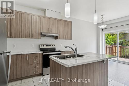 217 Louise Street, Welland, ON - Indoor Photo Showing Kitchen With Stainless Steel Kitchen With Double Sink With Upgraded Kitchen