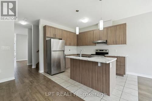217 Louise Street, Welland, ON - Indoor Photo Showing Kitchen With Double Sink
