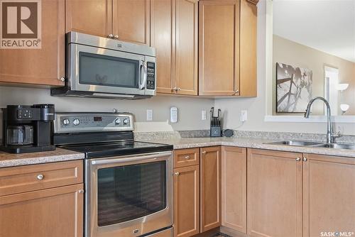 219 Henick Crescent, Saskatoon, SK - Indoor Photo Showing Kitchen With Double Sink