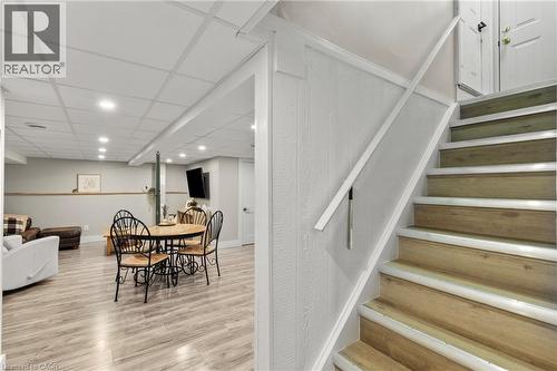 Dining area with stairs, recessed lighting, light wood-style floors, and a paneled ceiling - 40 Bula Drive, St. Catharines, ON - Indoor Photo Showing Other Room