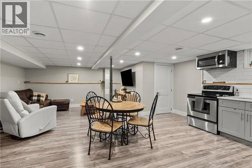 Dining space featuring light wood-type flooring, recessed lighting, and a paneled ceiling - 40 Bula Drive, St. Catharines, ON - Indoor