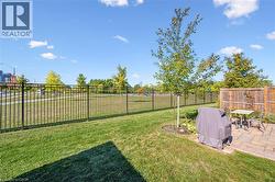 Fenced backyard with a patio area - 