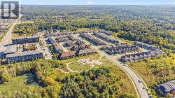 View of property location featuring a forest - 