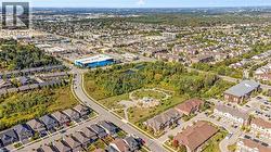 Aerial overview of property's location featuring nearby suburban area - 