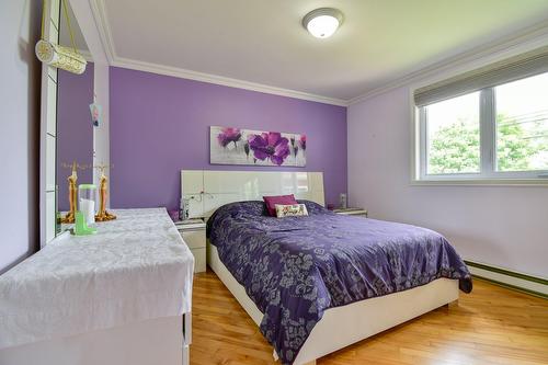 Primary bedroom - 5201 Rue Honoré-Beaugrand, Montréal (Mercier/Hochelaga-Maisonneuve), QC - Indoor Photo Showing Bedroom