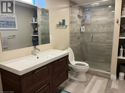 Bathroom with vanity, light wood-style flooring, and a stall shower - 235 Fearnwood Street, Cambridge, ON - Indoor Photo Showing Bathroom