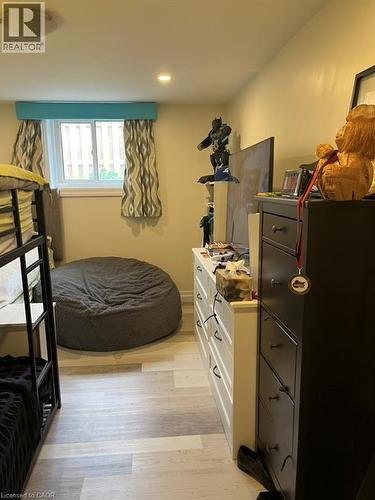 Bedroom featuring light wood-style floors and recessed lighting - 235 Fearnwood Street, Cambridge, ON - Indoor