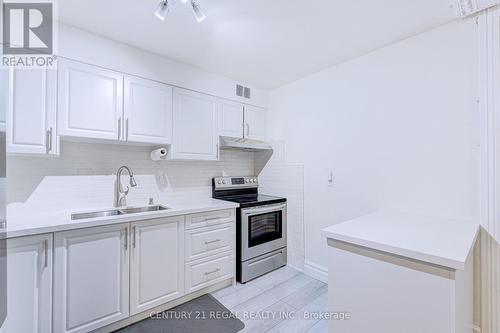 139 - 366 The East Mall, Toronto, ON - Indoor Photo Showing Kitchen With Double Sink