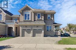 153 WHITLOCK AVENUE  Milton, ON L9E 1G1