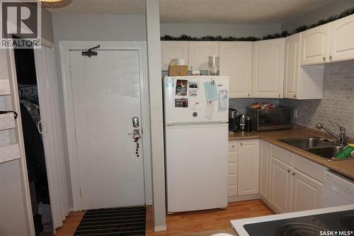 303 2315 Mcintyre Street, Regina, SK - Indoor Photo Showing Kitchen With Double Sink