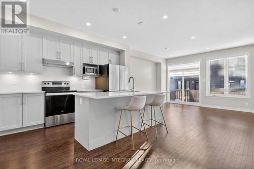 Kitchen and Hall - 165 Angelonia Crescent, Ottawa, ON - Indoor Photo Showing Kitchen With Stainless Steel Kitchen With Upgraded Kitchen