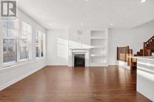 Hall - 165 Angelonia Crescent, Ottawa, ON - Indoor Photo Showing Living Room With Fireplace