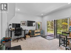 Lower level rec room with access to yard. - 