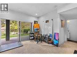 Lower level rec room with access to yard. - 