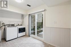 Lower Level Den/Mudroom/Laundry/Walk out - 