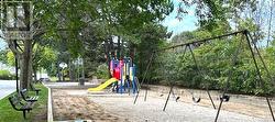 Watch your kids on the condo playground. - 